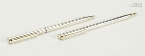 Tiffany & Co silver propelling pencil and ball point pen, housed in a fitted case with box : For