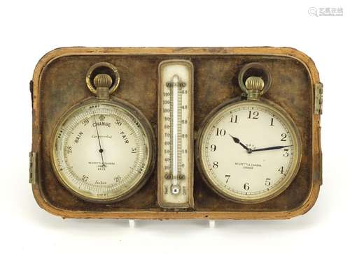 Negretti and Zambra travel set comprising a compensated barometer numbered 8439, eight day clock and