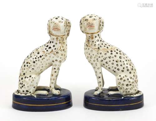 Pair of Staffordshire seated Dalmatians, each 13.5cm high : For Further Condition Reports Please