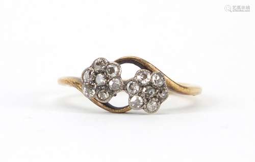 18ct gold diamond double flower head ring, size M, approximate weight 2.4g : For Further Condition