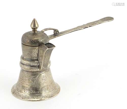 Middle Eastern silver pourer, engraved with script, indistinct impressed marks, 11cm high,