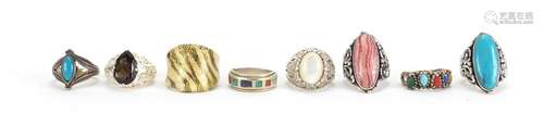 Sixteen dress rings, some silver set with semi precious stones, various sizes : For Further