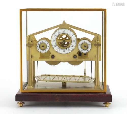 Brass Congreve style Rolling Ball Clock clock with three enameled dials, housed under a glass dome