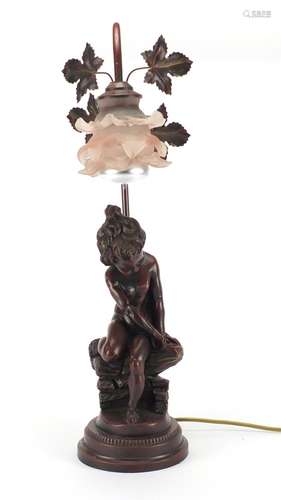 Art Nouveau style bronzed nude boy lamp with pink frilled glass shade, 56cm high : For Further