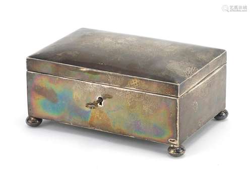 Rectangular silver lockable casket with ball feet and silk lined interior, by Walker & Hall, 15.