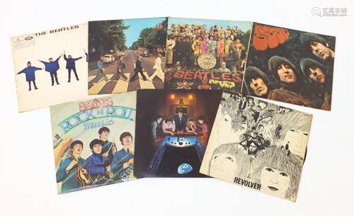 Seven Beatles vinyl LP's including Sgt. Pepper's Lonely Hearts Club Band with cut out, Abbey