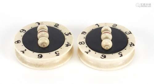 Pair of Victorian carved bone and ebony whist markers, each 4cm in diameter : For Further