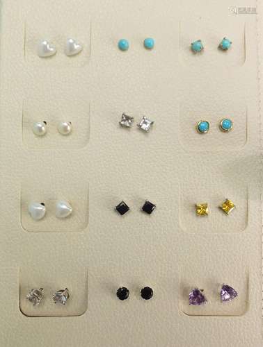 Forty two pairs of silver stud earrings set with semi precious stones : For Further Condition