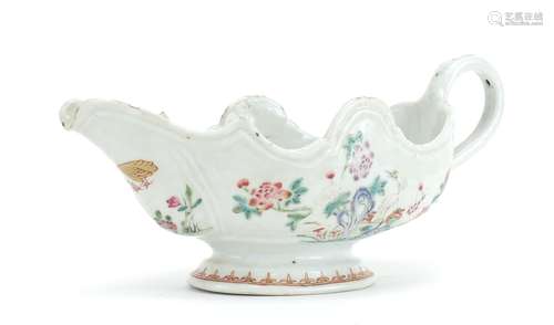 Chinese porcelain sauce boat, hand painted in the famille rose palette with flowers, 24cm in