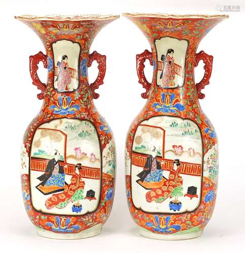 Pair of Japanese Arita porcelain vases with twin handles, each hand painted with figures and