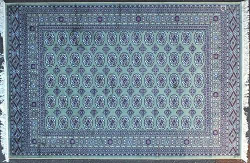 Rectangular Bokhara design green ground floral rug, 230cm x 160cm : For Further Condition Reports