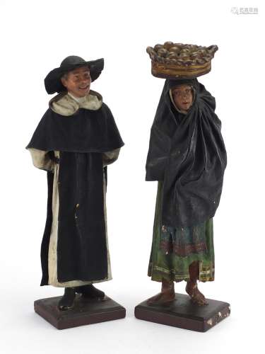 Pair of carved wood and plaster figures of peasants, the largest 38.5cm high : For Further Condition