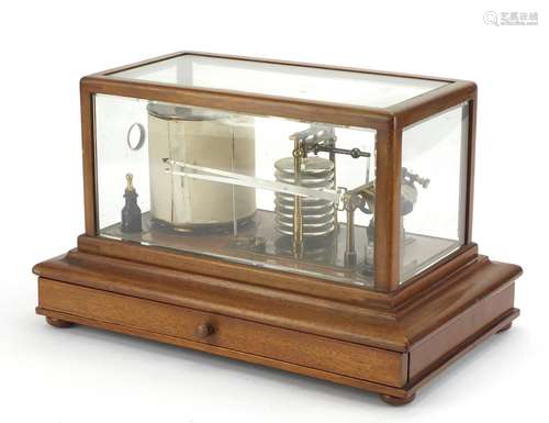 Negretti & Zambra barograph housed in a mahogany case with base drawer, registered number 476369,