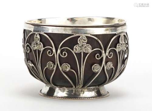 Unmarked silver coconut footed bowl, set with miniature Middle Eastern coins, 5.5cm high : For