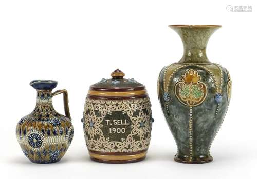 Royal Doulton stoneware including an Art Nouveau vase and a tobacco jar inscribed T Sell dated 1900,