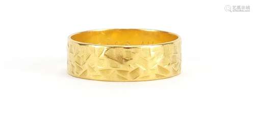 22ct gold wedding band with engraved decoration, size M, approximate weight 3.6g : For Further