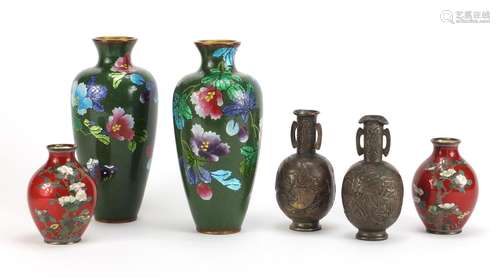 Three pairs of Japanese vases including two cloisonné examples enamelled with flowers, the largest