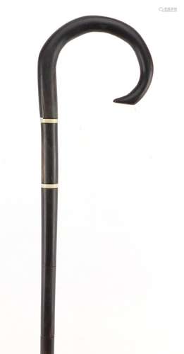 Segmented horn walking stick with ivory mounts, possibly rhinoceros horn, 91cm in length,