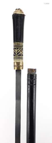 Indian ebonised sword stick with carved bone section and steel blade, 91.5cm in length : For Further