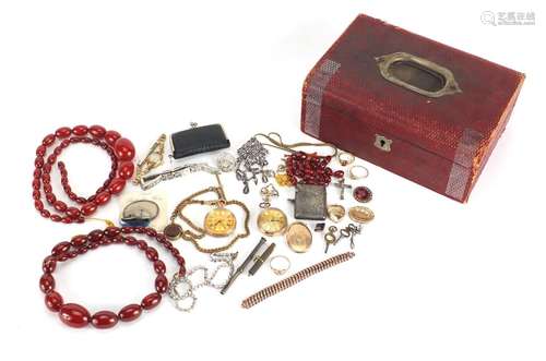 Antique and later jewellery including cherry amber coloured bead necklaces, ladies 9ct gold pocket