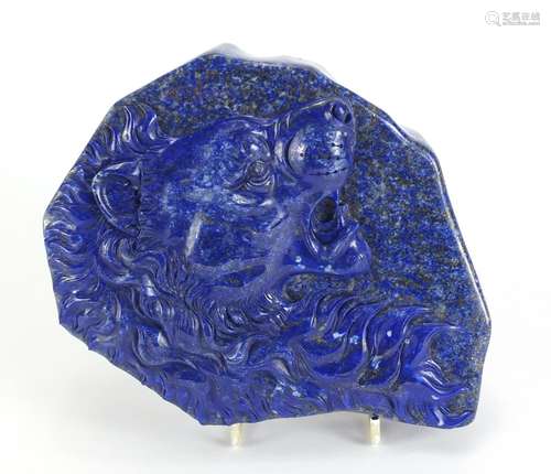 Large Chinese lapis lazuli panel carved with a lions head, housed in a fitted box, the panel 20cm