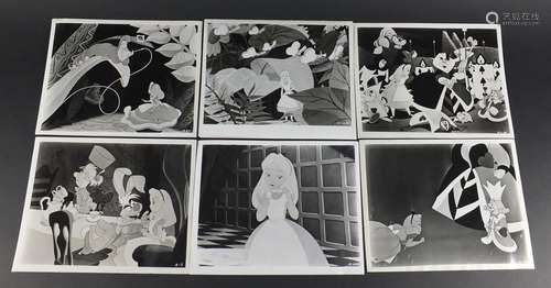 Six vintage Alice in Wonderland black and white photographs each with R K O Radio stamps to the