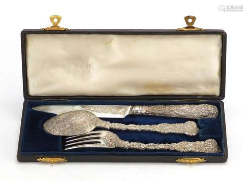 Good Georgian silver knife, fork and spoon Christening set, with fruiting vines, by William Traies