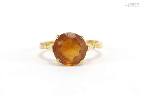 Unmarked gold citrine solitaire ring (tests as 18ct gold), size O, approximate weight 4.3g : For