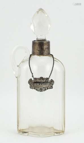 Victorian cut glass decanter with silver collar and a Georgian decanter label, the decanter