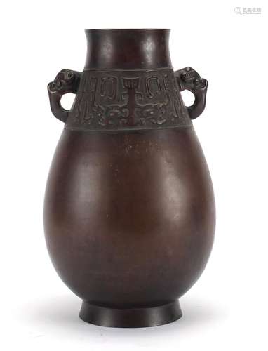 Chinese archaic style bronze vase with elephant head handles, six figure character marks to the