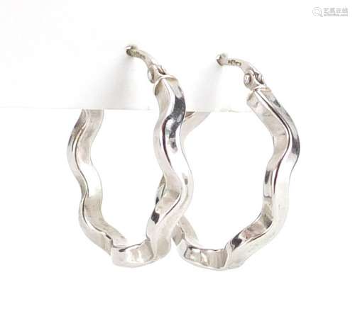 Pair of 9ct white gold hoop earrings, 2.5cm in diameter, approximate weight 2.5g : For Further