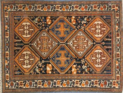 Rectangular North West Persian Yalameg rug, the central field having a flower and bird design onto a