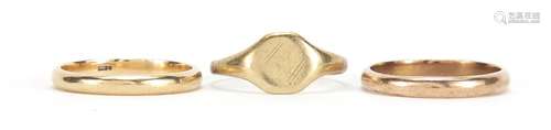 Three 9ct gold rings including two wedding bands, approximate weight 6.6g : For Further Condition