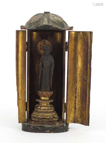 Asian partially gilt lacquered wood buddha, housed in a case, 29cm high : For Further Condition