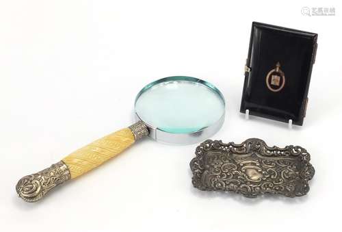 Antique objects comprising a tortoiseshell card case, embossed silver pin tray and an ivory