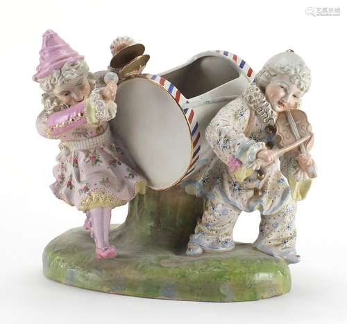 Victorian bisque hand painted figure group of two young musicians, 30cm high : For Further Condition