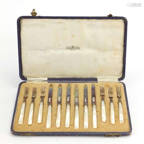 Set of six silver and mother of pearl knives and forks by Alexander Clark & Co Ltd, housed in a