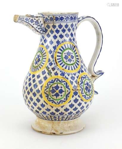 19th century Turkish Kutahya pottery water jug, hand painted with flower heads, 25.5cm high : For