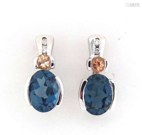 Pair of 9ct white gold blue stone and diamond earrings, set with diamonds and semi precious