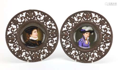 Pair of 19th century continental cabinet plates, each hand painted with a portrait of a young