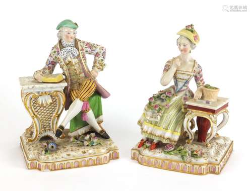 Pair of 19th century porcelain figures by Jacob Petit, modelled as a seated male and female,