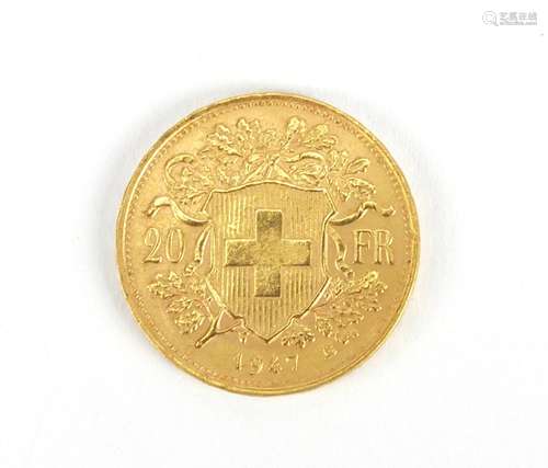 Swiss 1947 gold twenty francs : For Further Condition Reports and Live Bidding Please Go to Our