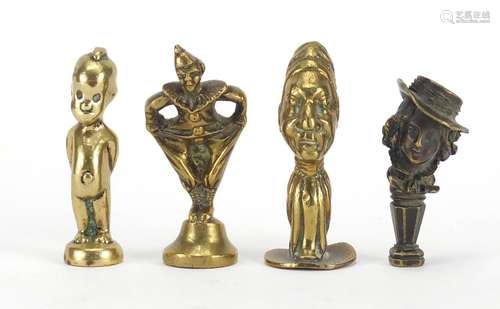 Four antique pipe tampers including a pierrot design example, the largest 7cm high : For Further