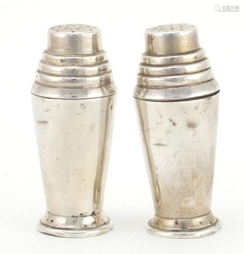 Pair of Art Deco style silver casters in the form of cocktail shakers, by Walker & Hall Birmingham