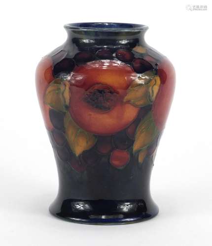 Moorcroft baluster vase hand painted and tube lined in the pomegranate pattern, impressed marks