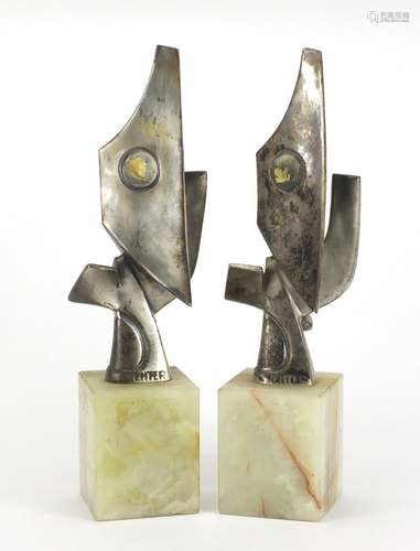 Pair of Art Deco modernist silvered sculptures by Jenter, raised on a square onyx block bases, 39.