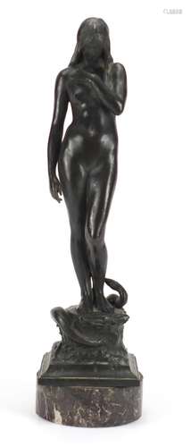 Antique patinated bronze study of a standing nude female, raised on a circular marble base, 44cm