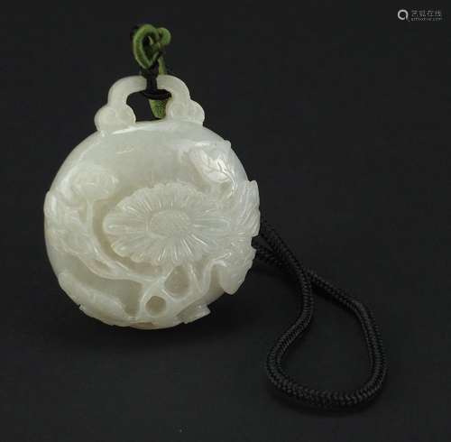 Chinese white jade belt hook, finely carved with flowers, 6cm high : For Further Condition Reports