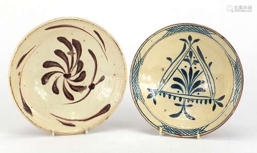 Two Turkish Canakkale pottery bowls, hand painted with stylised fonts, the largest 21.5cm in