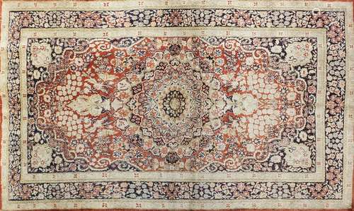 Fine Rectangular silk rug having all over stylised motifs within corresponding borders, onto a